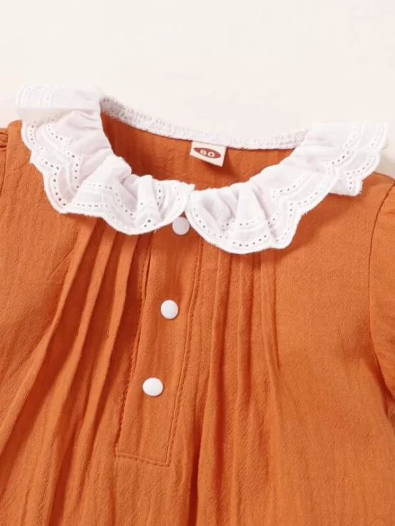 Baby Eyelet Embroidery Puff Sleeve Ruffle Hem Button Front Romper - Image 6
