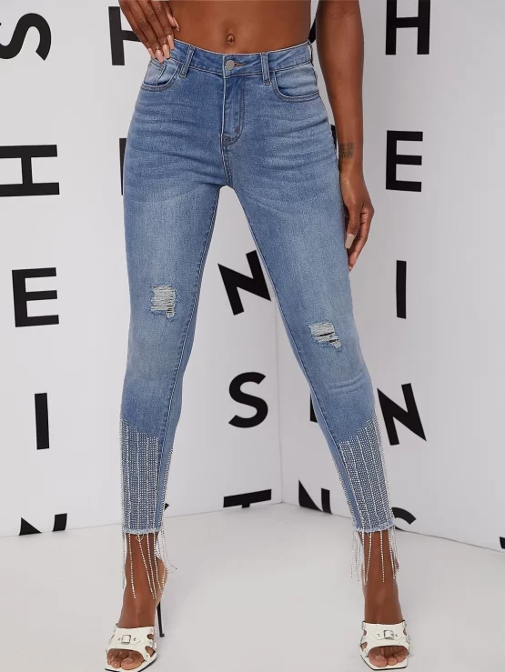 High Waisted Ripped Raw Hem Rhinestone Fringe Skinny Jeans